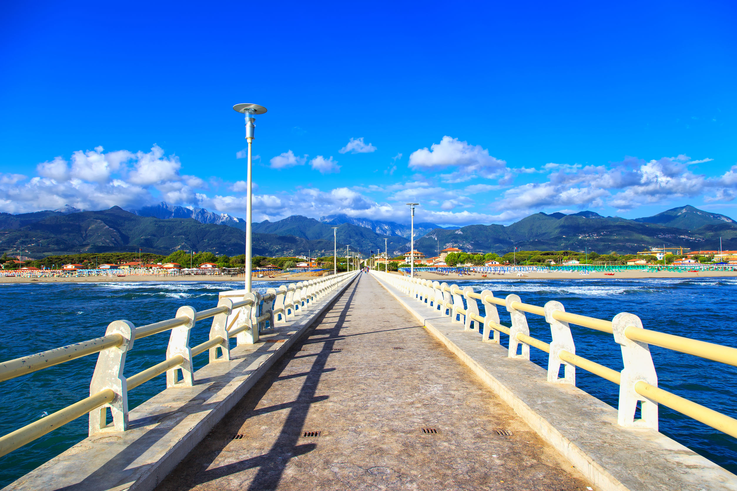 Pier, beach and Apuane mountains in Forte dei Marmi Versilia Tus